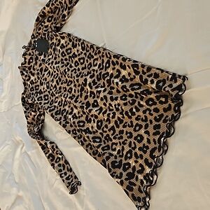 Leopard print girls long sleeve girls dress. Like Flo Dutch clothing brand.